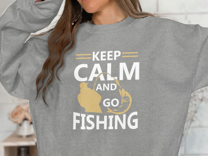 Gray sweatshirt with "Keep Calm and Go Fishing" text and fishing graphic.
