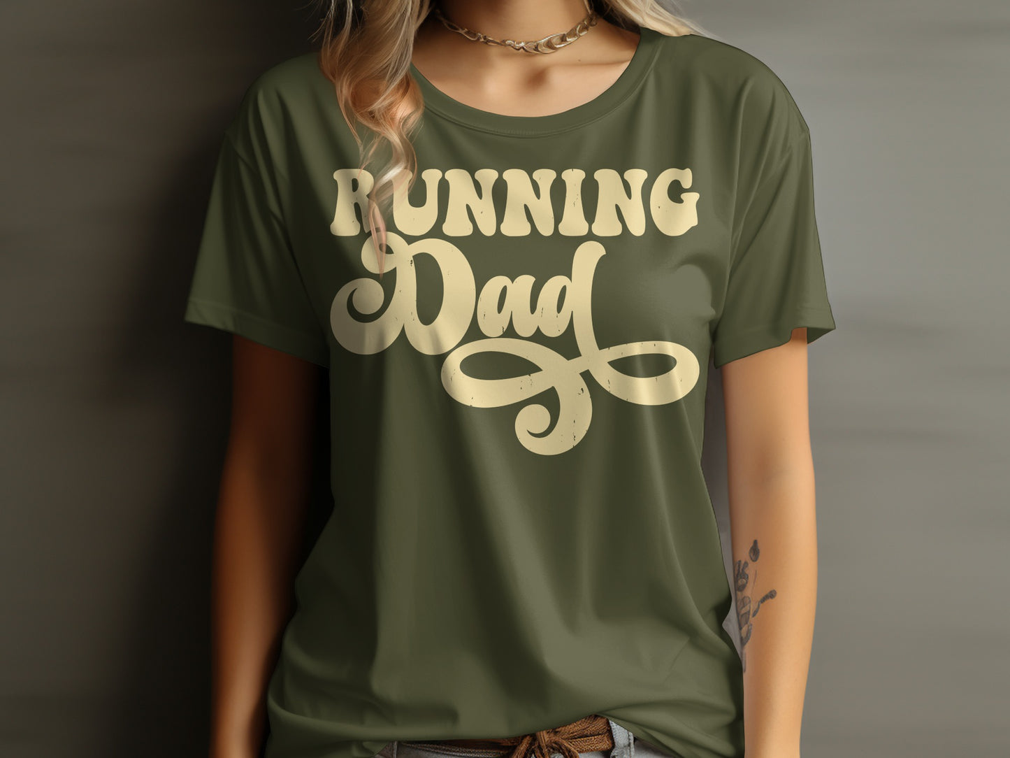 Green t-shirt with "Running Dad" in cream script font.