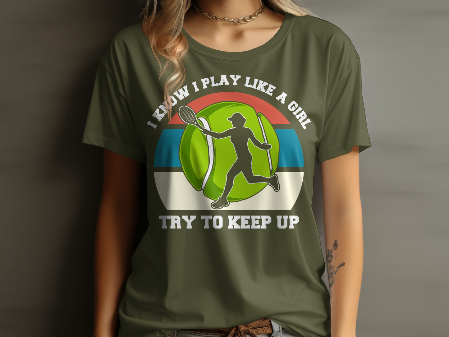 Green t-shirt with text "I Know I Play Like A Girl Try To Keep Up".