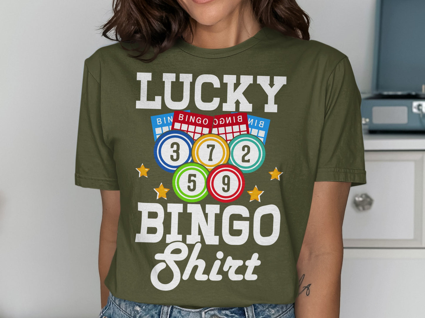 Olive green t-shirt with "LUCKY BINGO Shirt" and bingo cards.