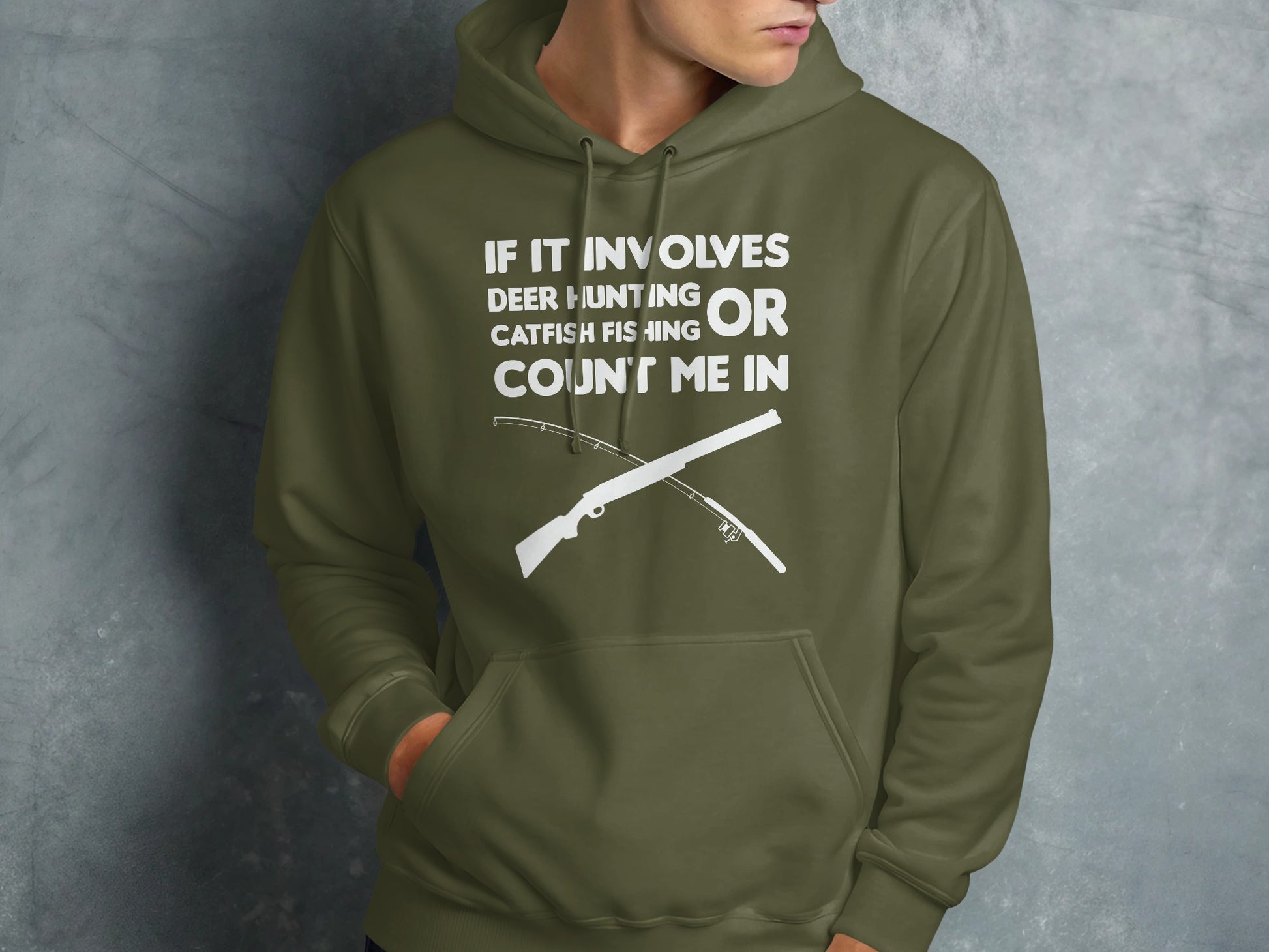 Green hoodie with white text: If it involves deer hunting or catfish fishing count me in.