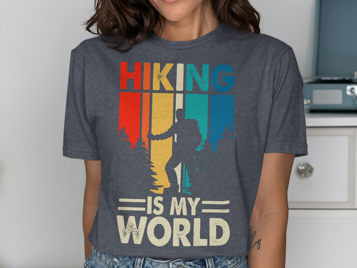 T-shirt with hiker silhouette and "Hiking Is My World" text.
