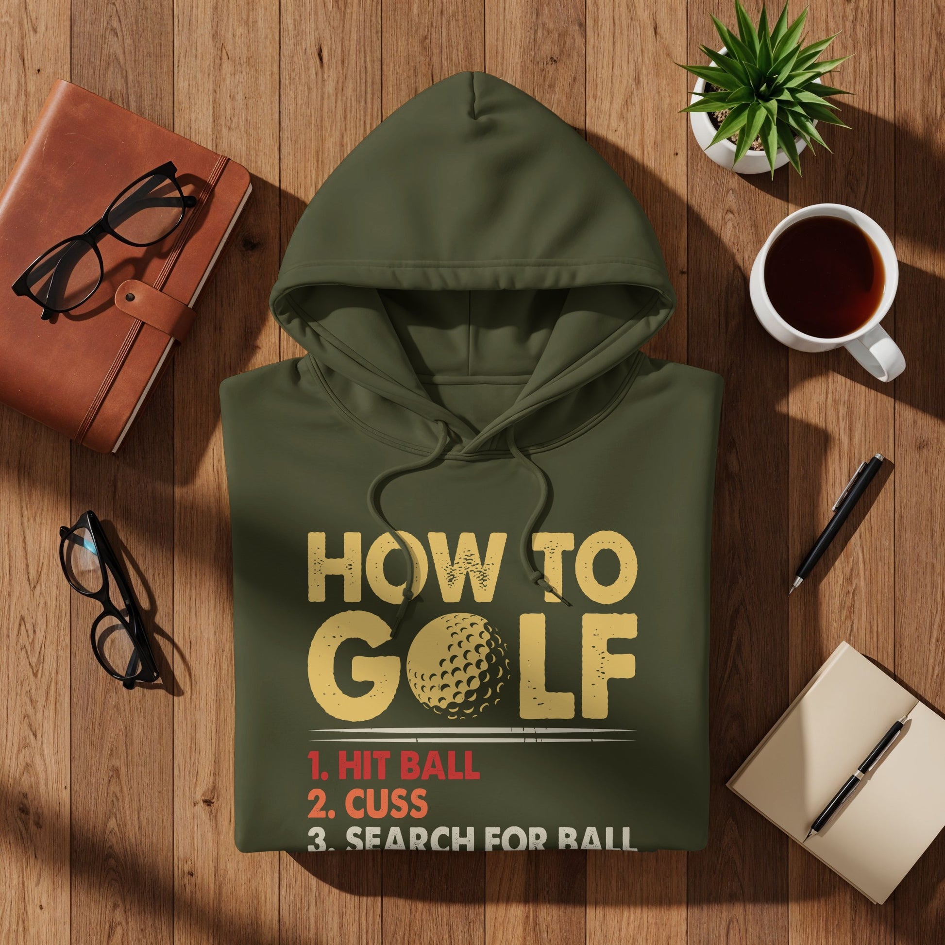 Olive green hoodie with "How to Golf" text and three humorous instructions.