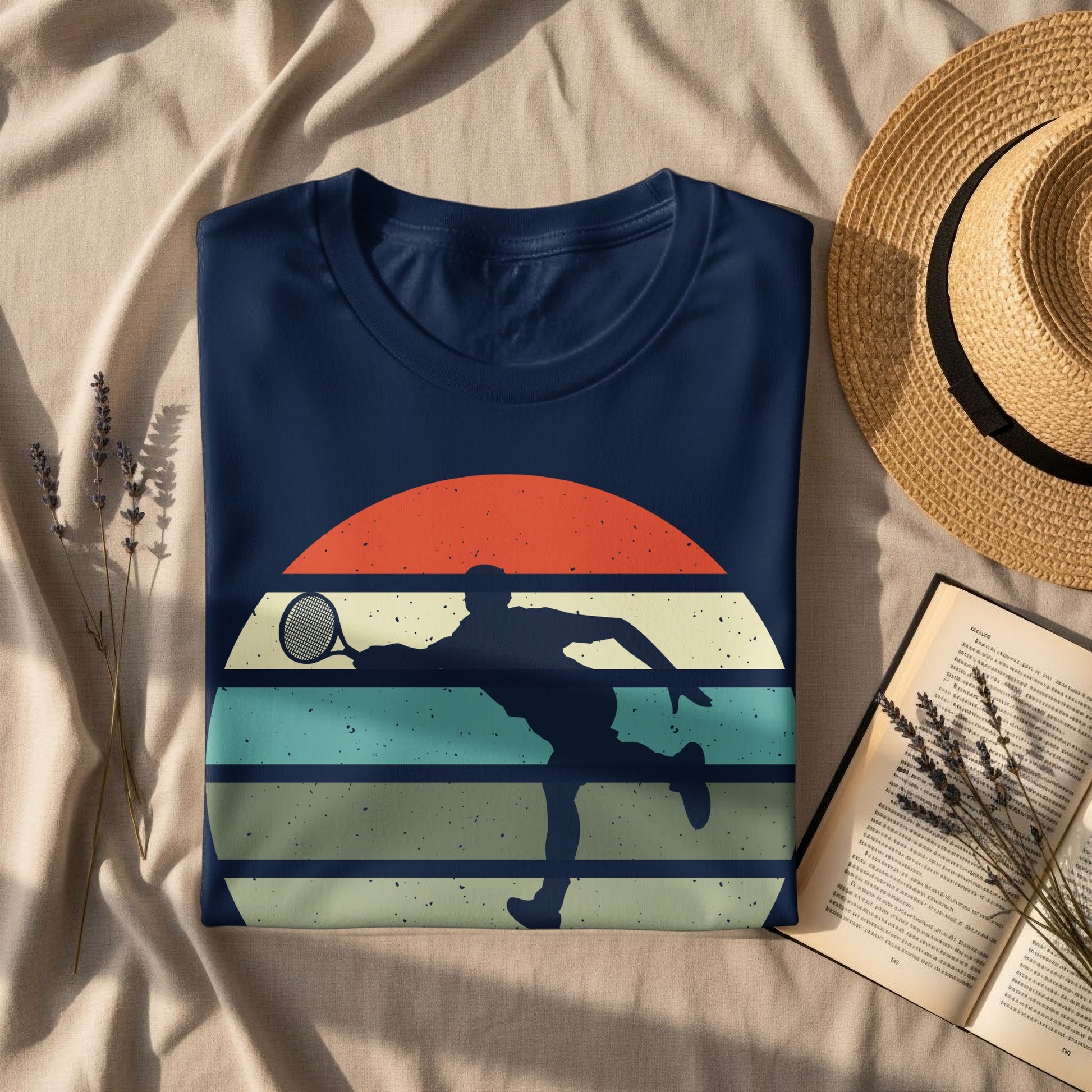 Navy t-shirt with retro tennis player graphic and sun.