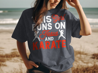 Dark t-shirt with red text "This Girl Runs On Jesus and Karate" and silhouette figures.