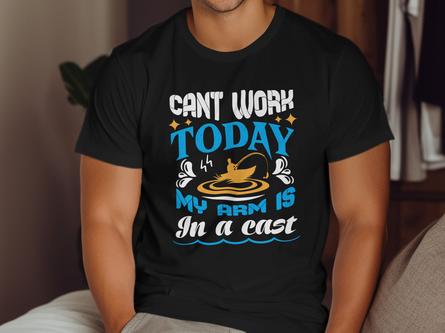 Black t-shirt with "Can't work today my arm is in a cast" fishing design.