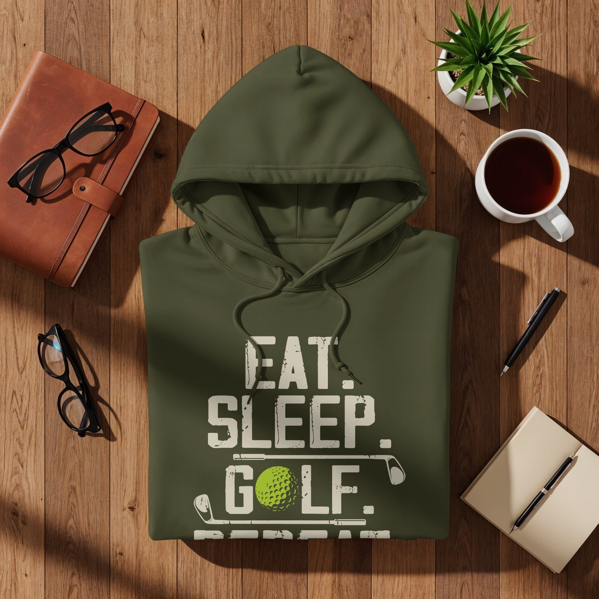 Green hoodie with "Eat. Sleep. Golf. Repeat." text and golf icons.
