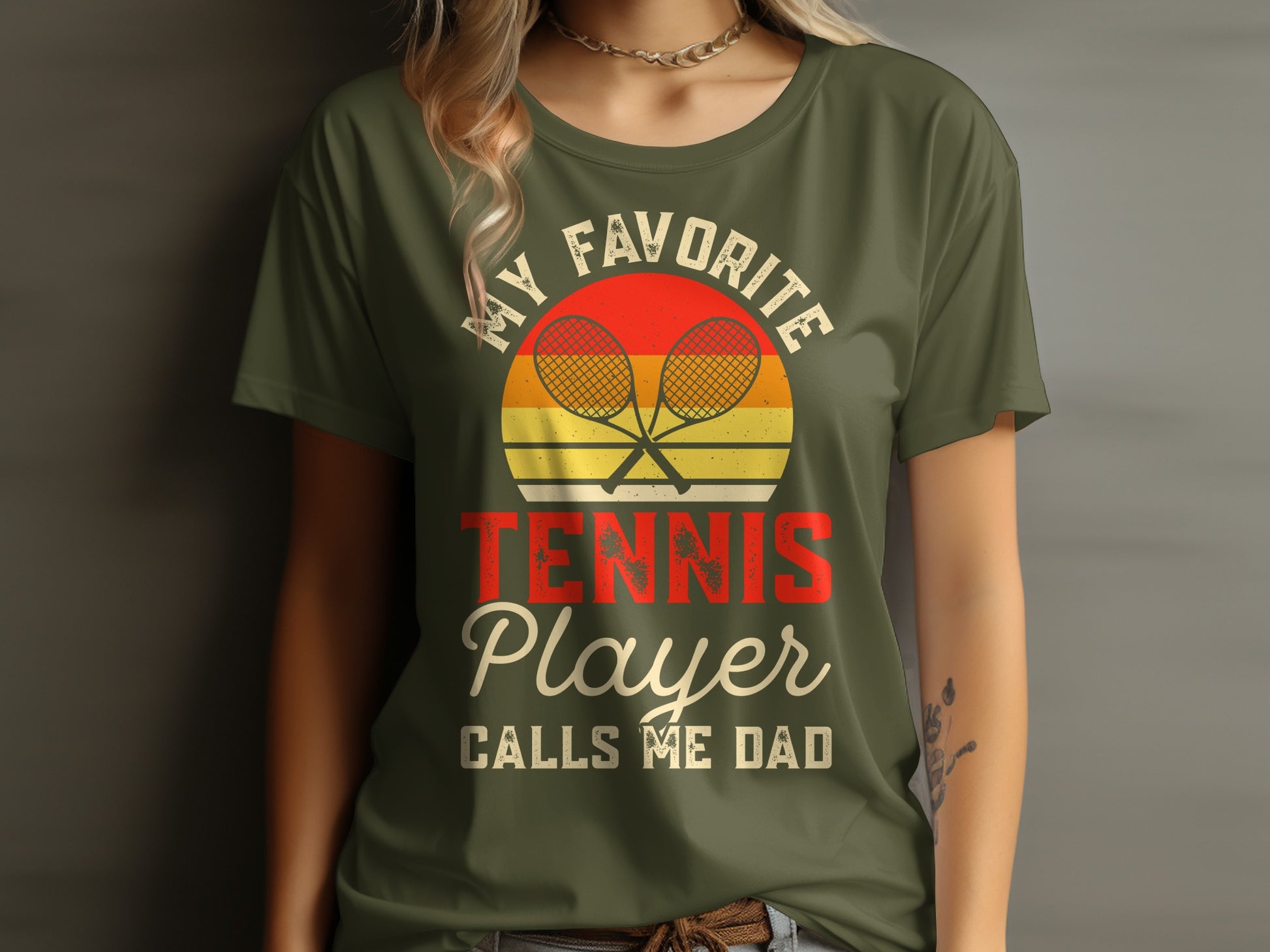 T-shirt with "My Favorite Tennis Player Calls Me Dad" text and crossed rackets.