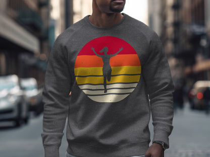 Dark grey sweatshirt with a circular graphic of a runner against a sunset.