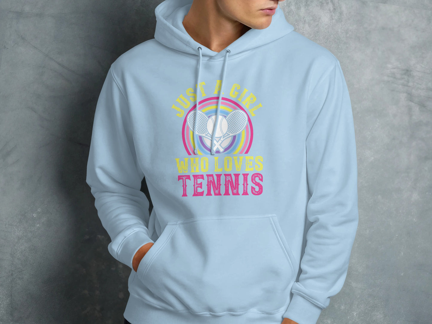 Light blue hoodie with "Just a girl who loves tennis" graphic and crossed tennis rackets.