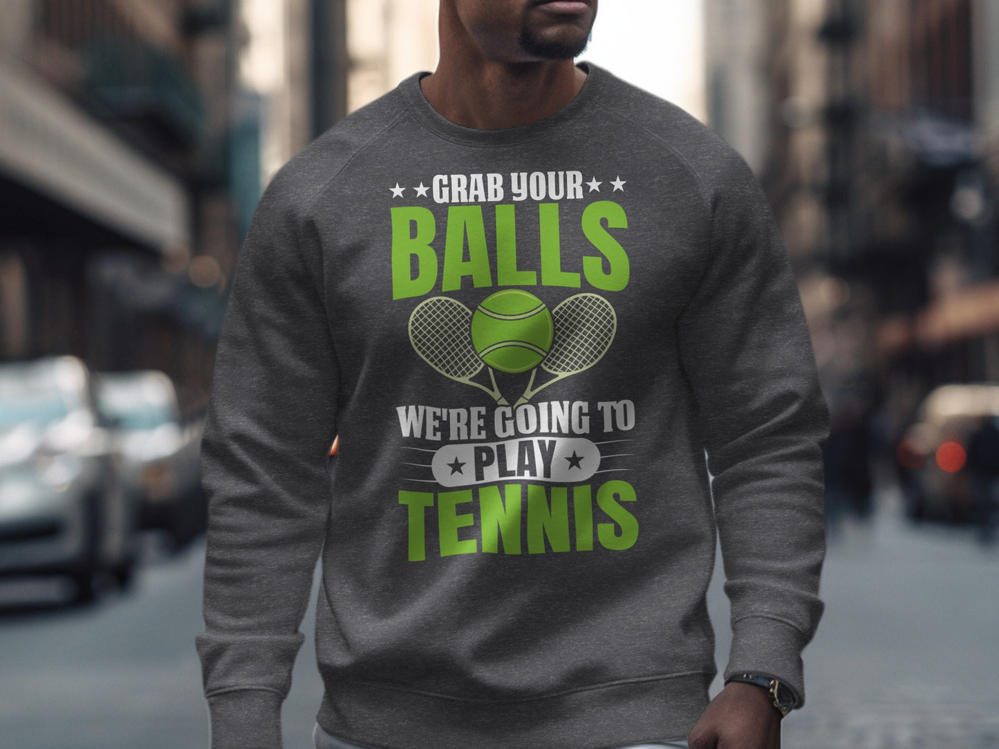 Men's grey sweatshirt with "Grab Your Balls We're Going To Play Tennis" text and tennis rackets.