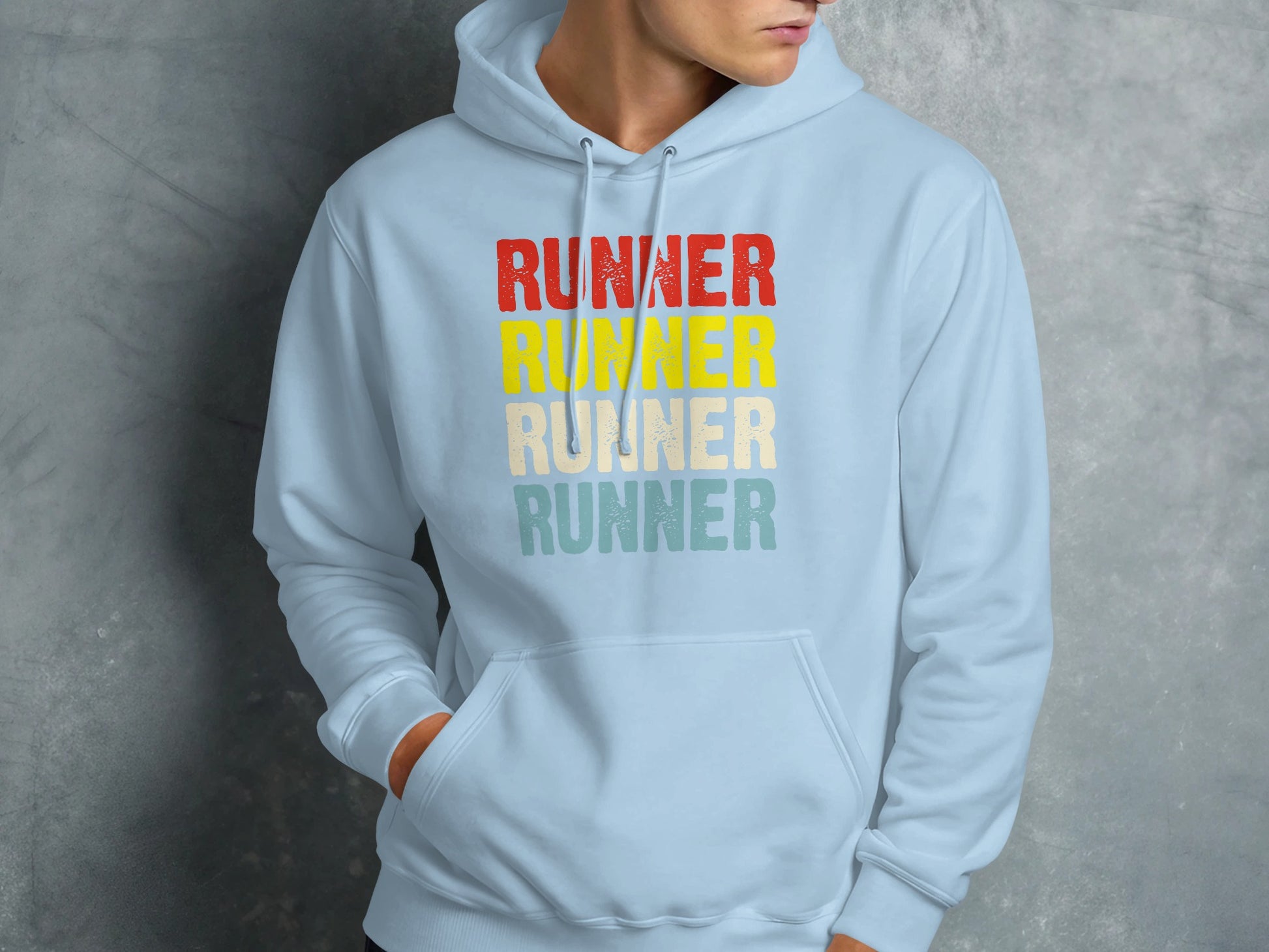 Light blue hoodie with "RUNNER" text stacked in red, yellow, and teal.