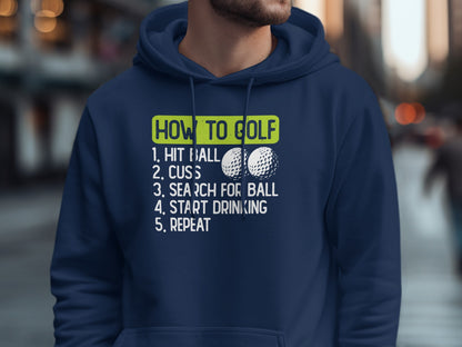 Navy hoodie with "How to Golf" steps and two golf balls.
