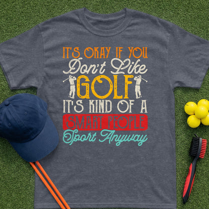 Dark t-shirt with text about golf, accompanied by a golf cap and balls.