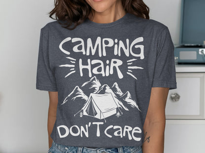 Dark gray t-shirt with white text "Camping Hair Don't Care" and tent and mountain graphic.