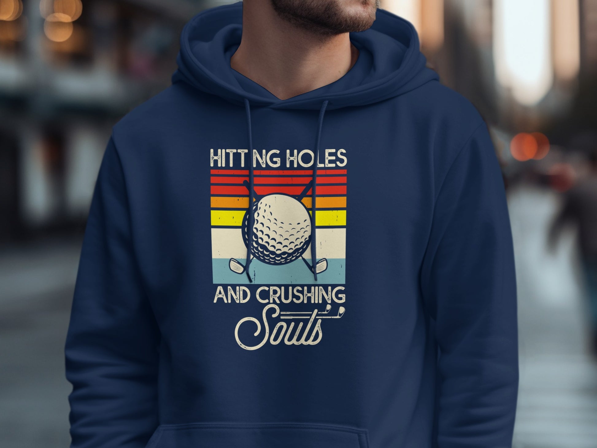 Navy hoodie with golf graphic and text "Hitting holes and crushing souls".