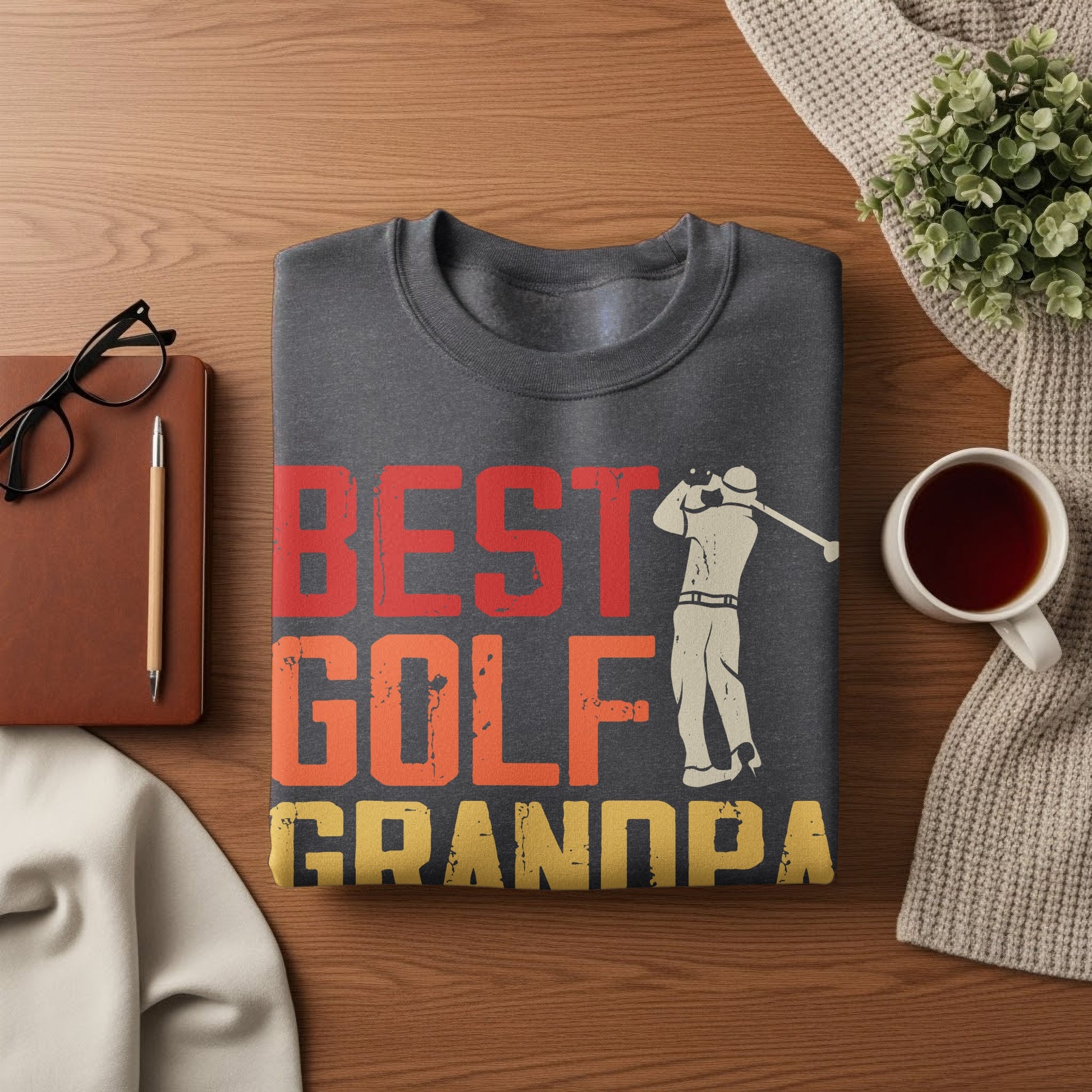 Grey sweatshirt with "BEST GOLF GRANDPA" text and golfer graphic.