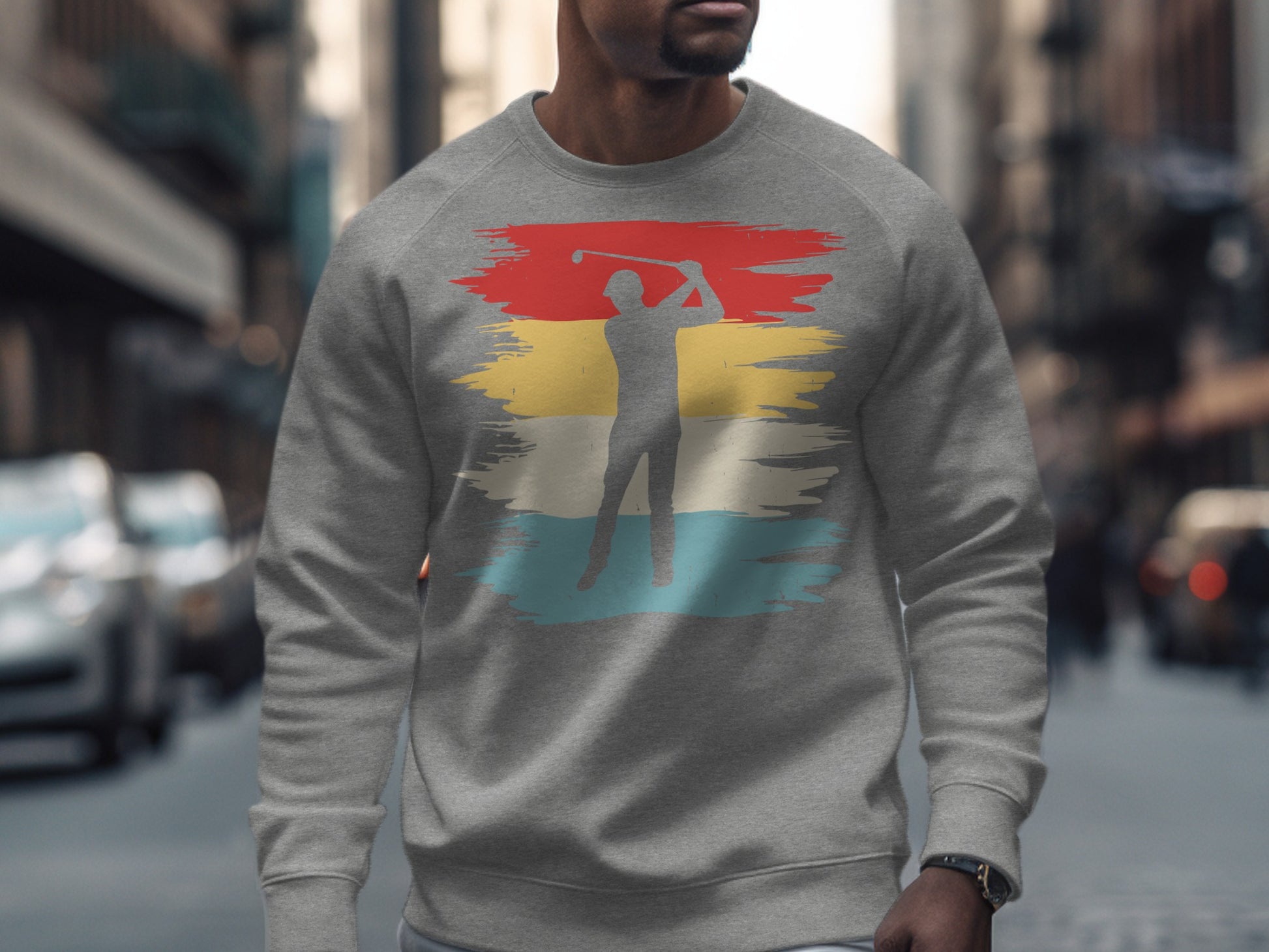 Grey sweatshirt with abstract golfer graphic and colorful stripes.