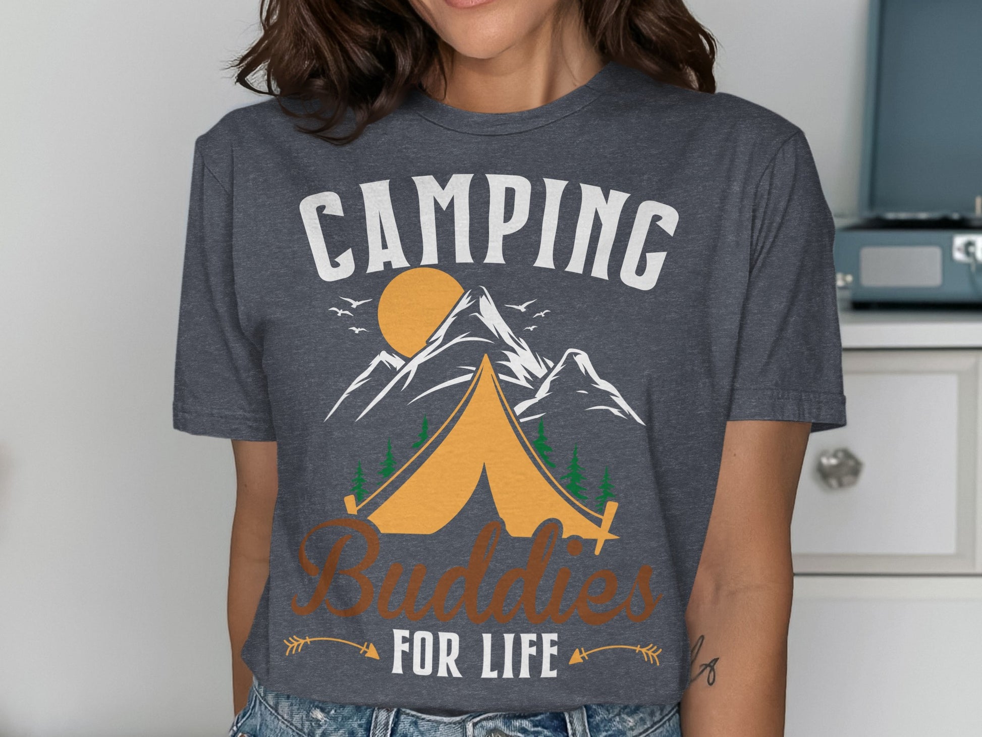 Camping Buddies For Life text with tent, sun, and mountains graphic.