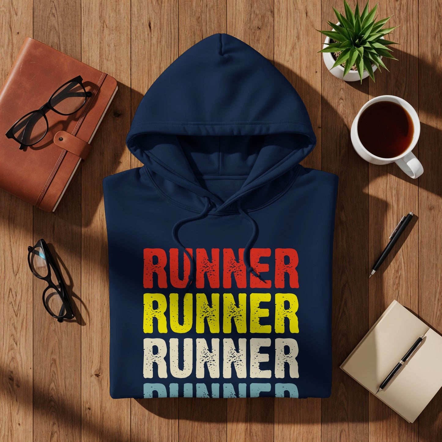 Navy blue hoodie with "RUNNER" printed in red, yellow, and blue text.