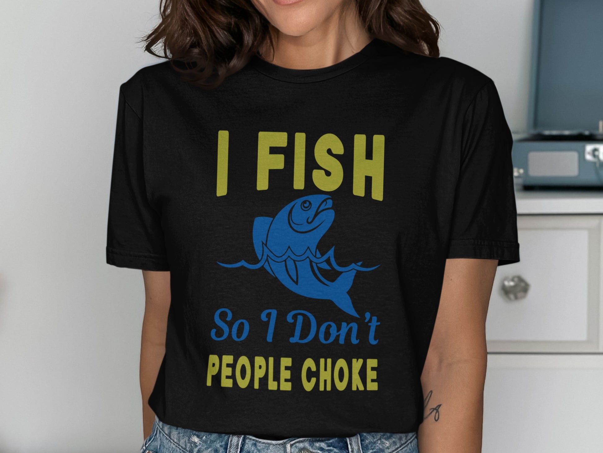 Black t-shirt with "I FISH so I don't PEOPLE CHOKE" and fish graphic.