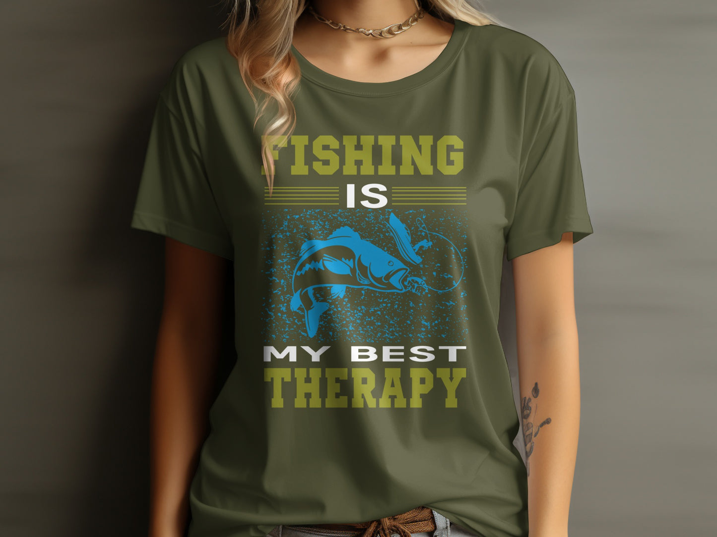 Green t-shirt with a blue bass jumping from water, "Fishing is my best therapy".
