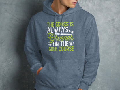 Gray hoodie with "The grass is always greener on the golf course" graphic.