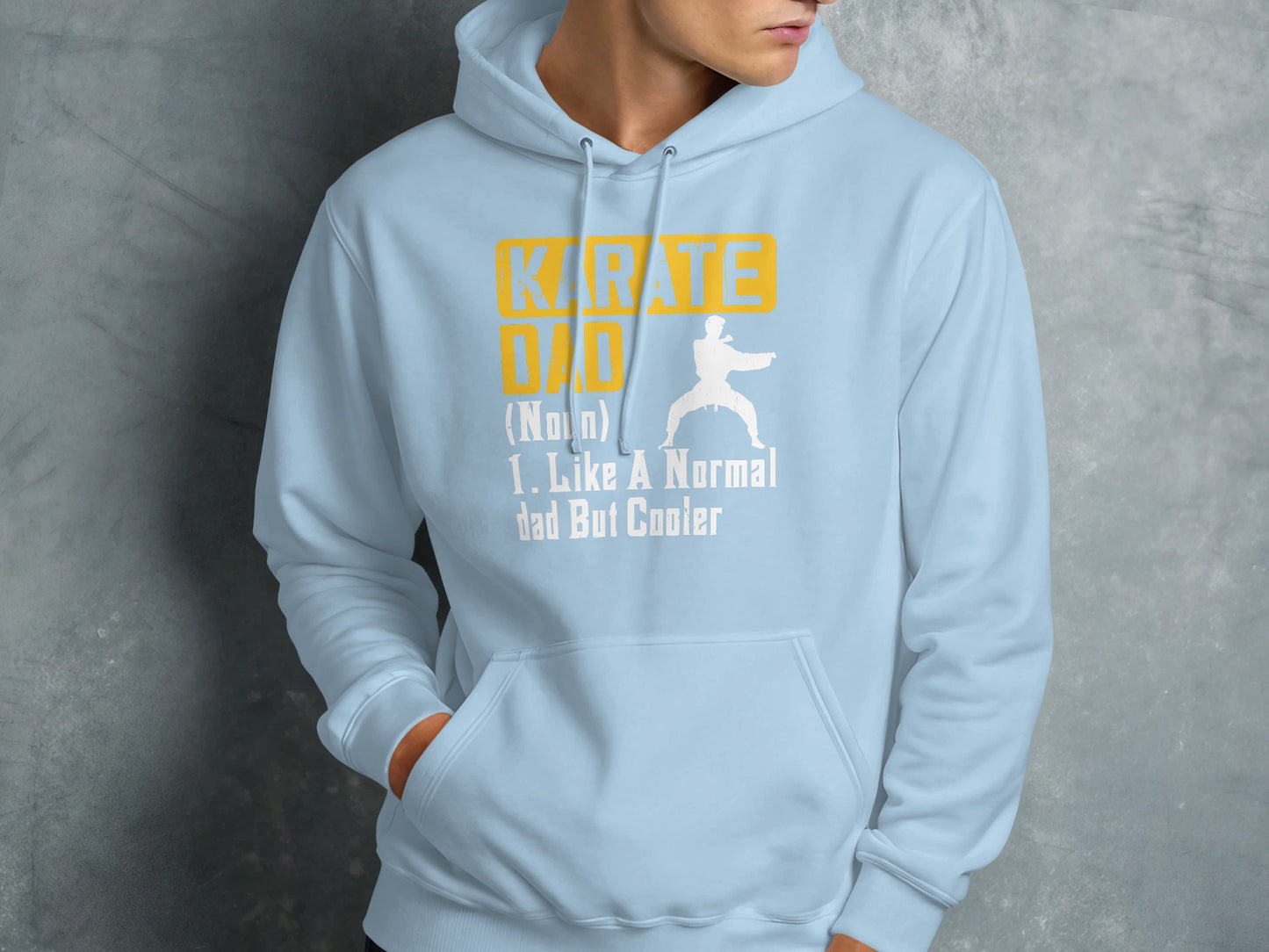 Light blue hoodie with "Karate Dad" text and karate figure.