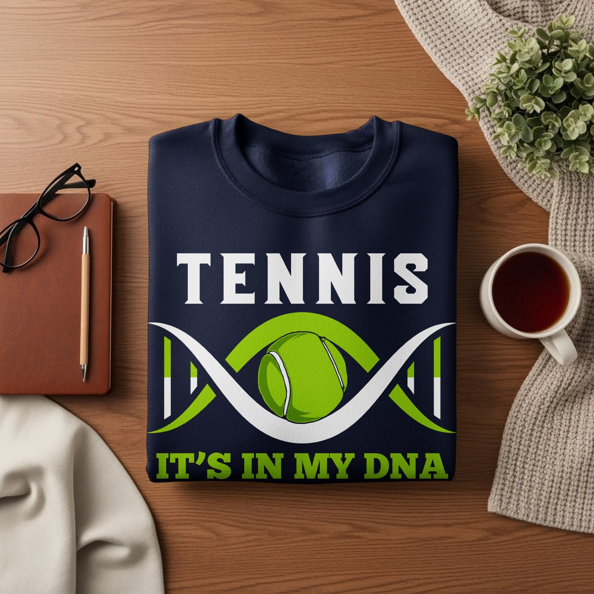 Navy sweatshirt with "TENNIS IT'S IN MY DNA" and a tennis ball DNA graphic.
