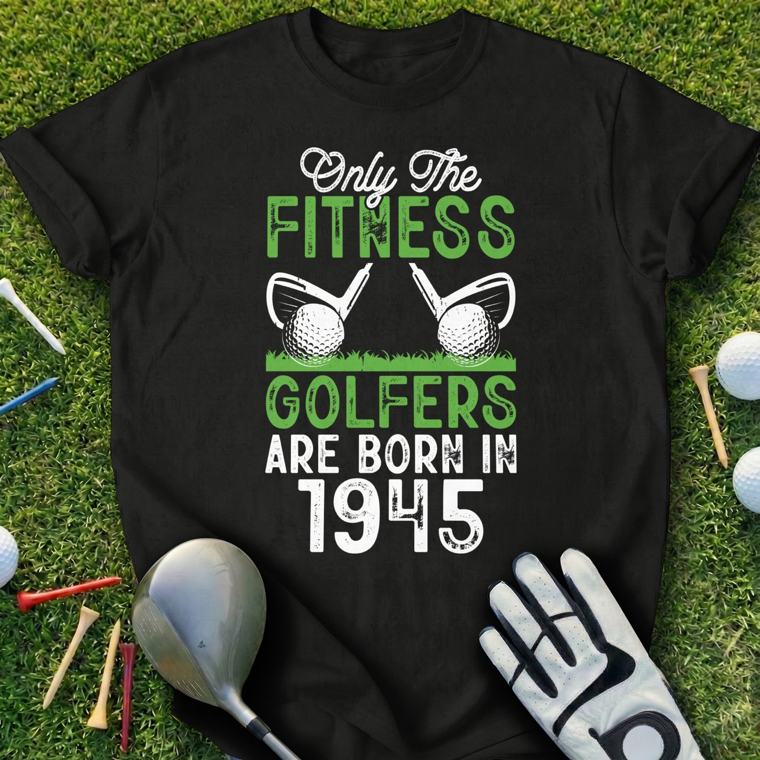 Black t-shirt with "Only The Fitness Golfers Are Born In 1945" text and golf balls.