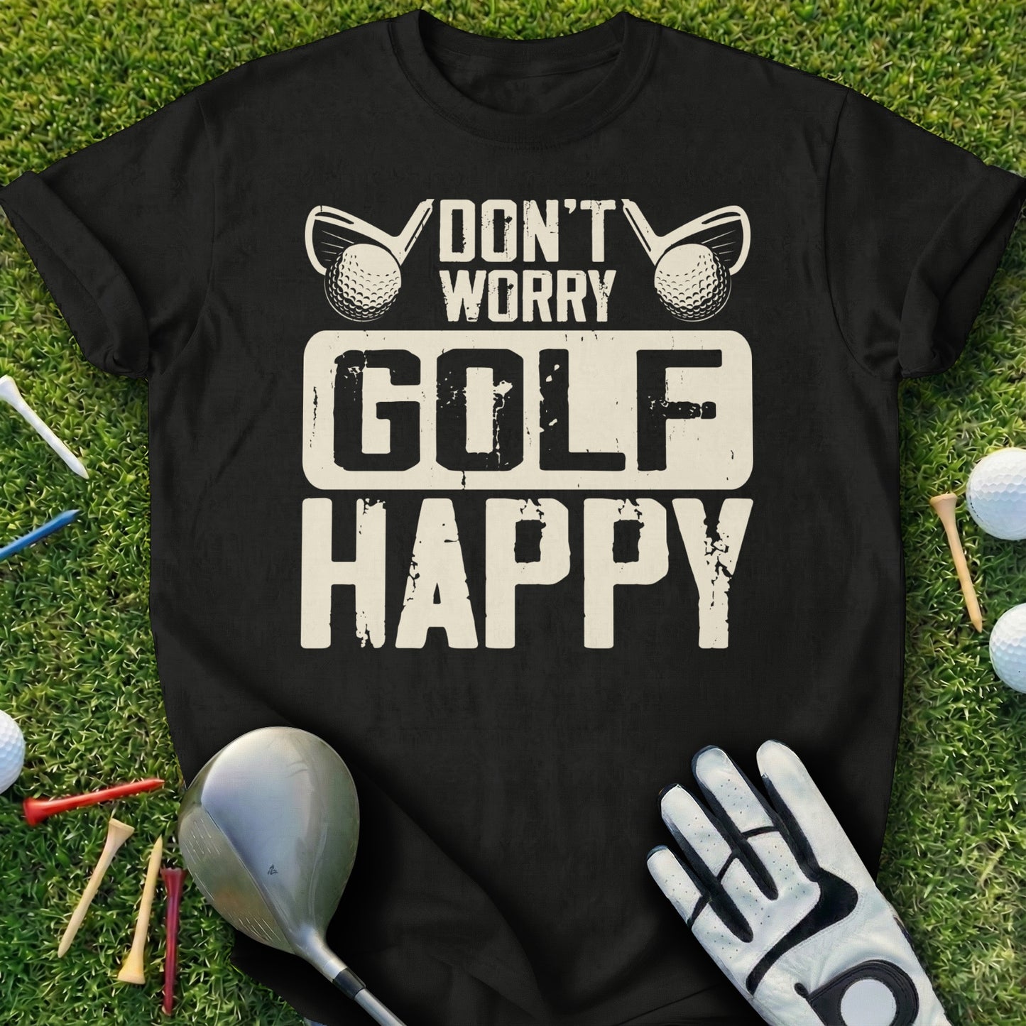 Black t-shirt with "DON'T WORRY GOLF HAPPY" text, golf clubs, balls, and tees.