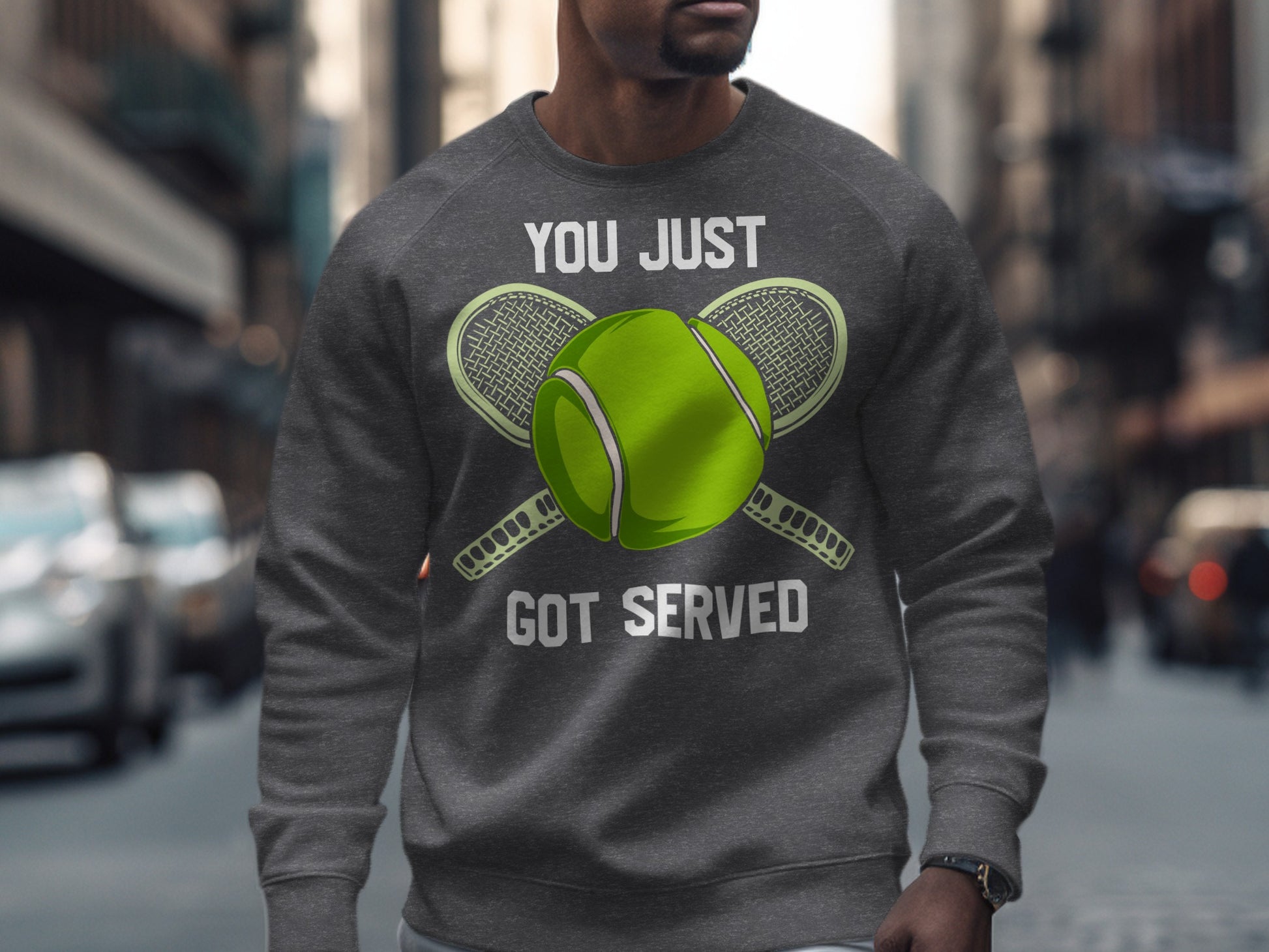 Gray sweatshirt with tennis ball and rackets, "You Just Got Served" text.