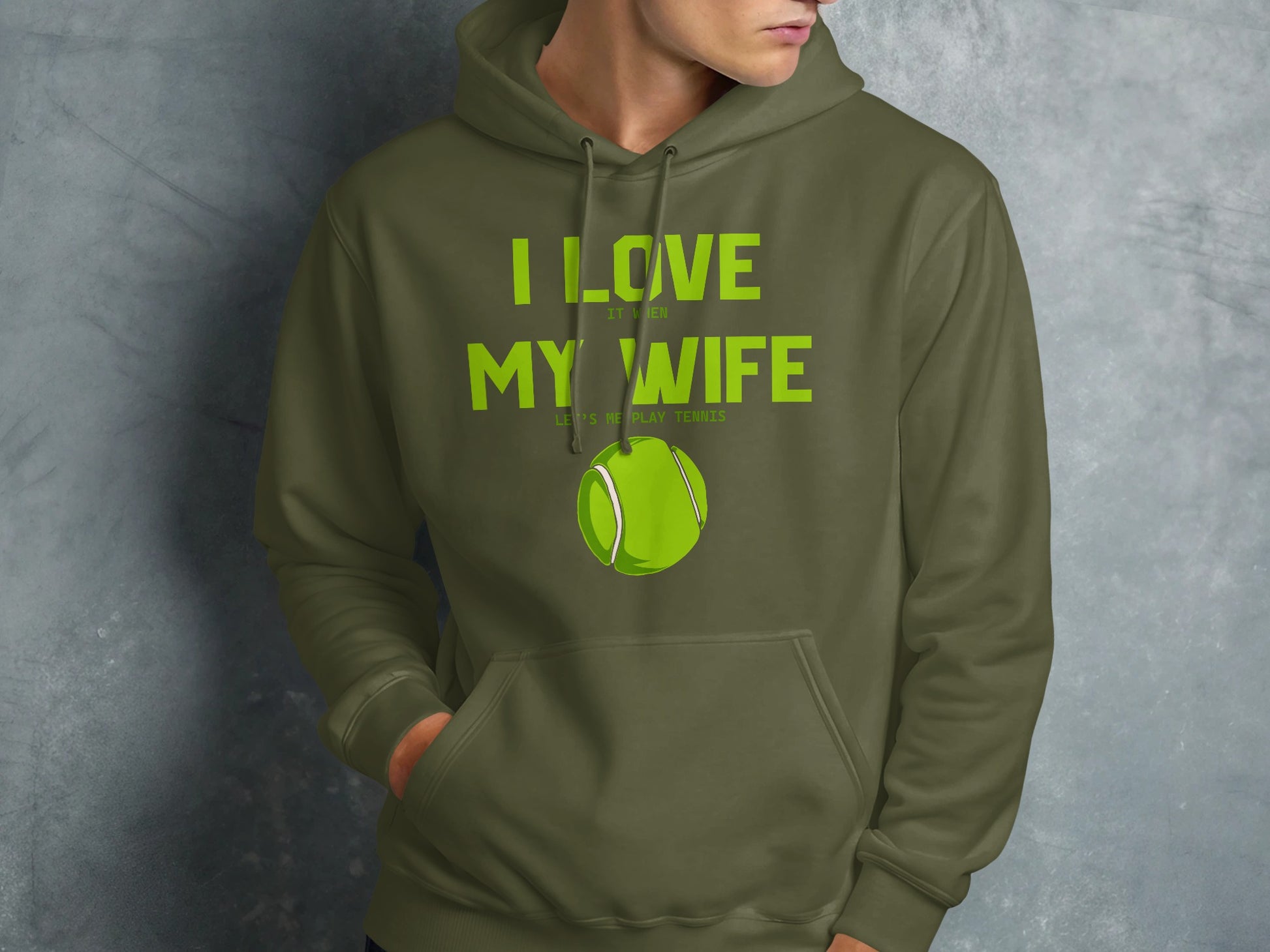 Green hoodie with "I love my wife, let's play tennis" and tennis ball graphic.
