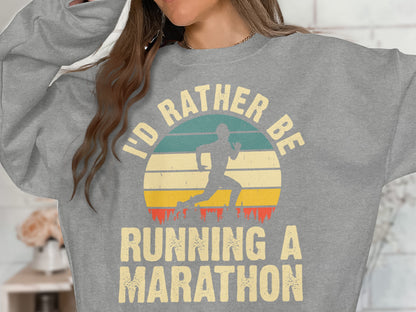 Gray sweatshirt with text "I'd rather be running a marathon" and runner silhouette.