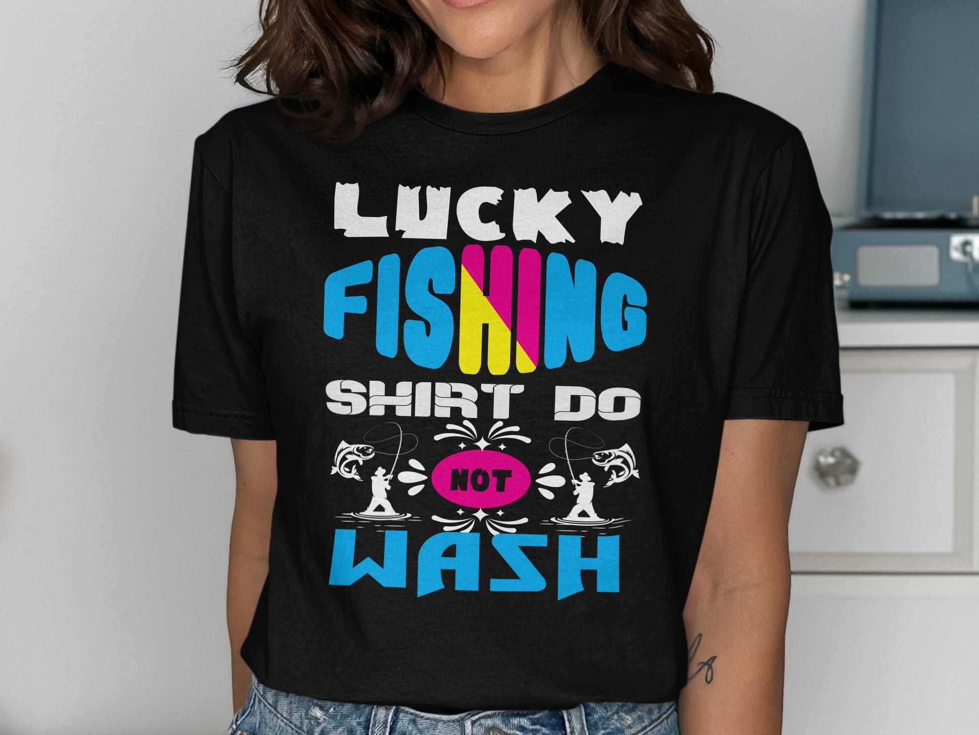 Black t-shirt with "Lucky Fishing Shirt Do Not Wash" text and fishing graphics.