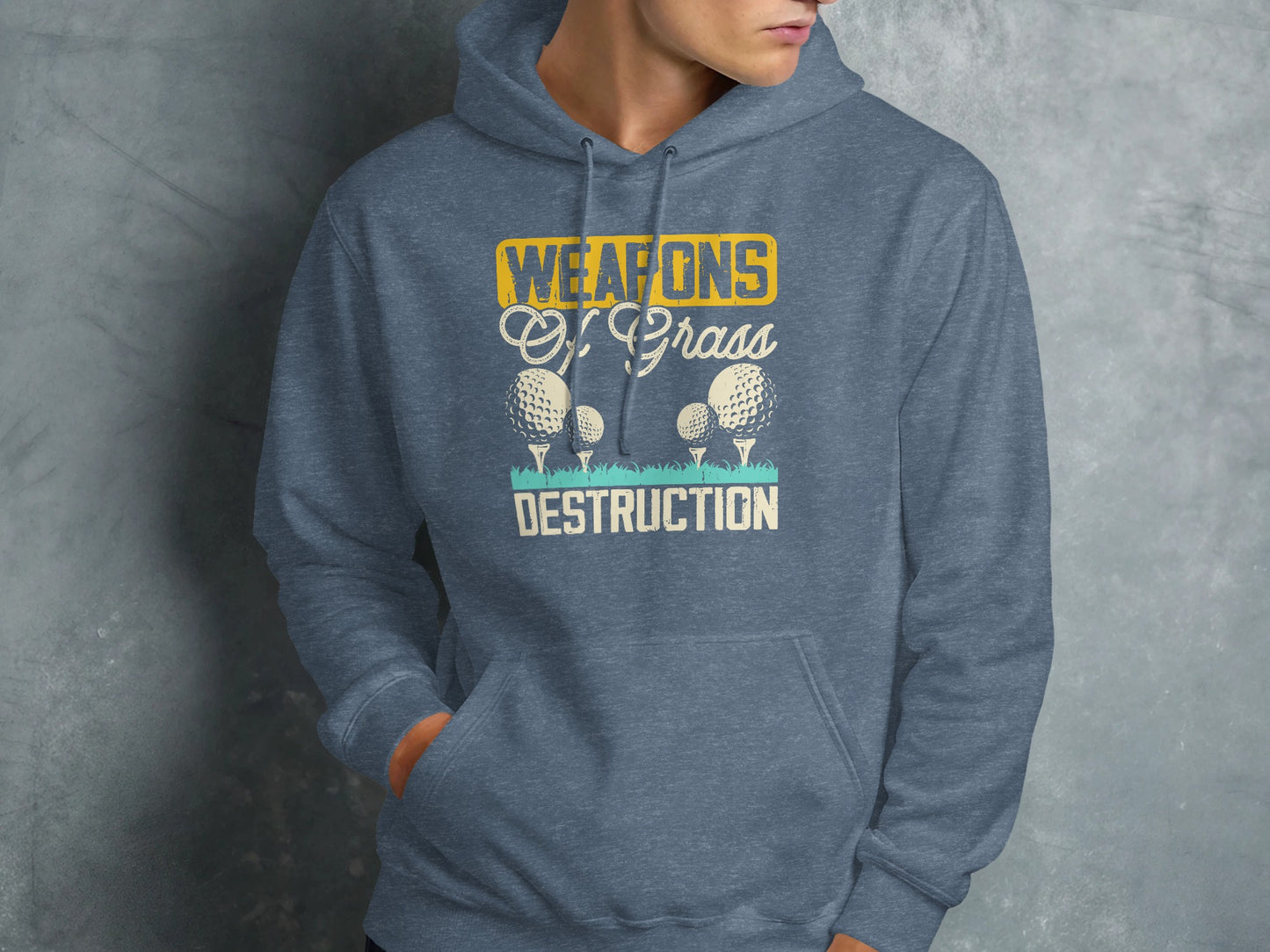 Blue hoodie with "Weapons of Grass Destruction" text and golf balls.
