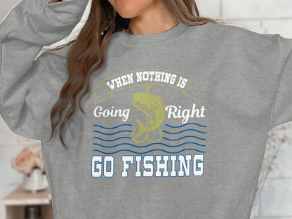 Gray sweatshirt with "When Nothing Is Going Right, Go Fishing" and a fish graphic.