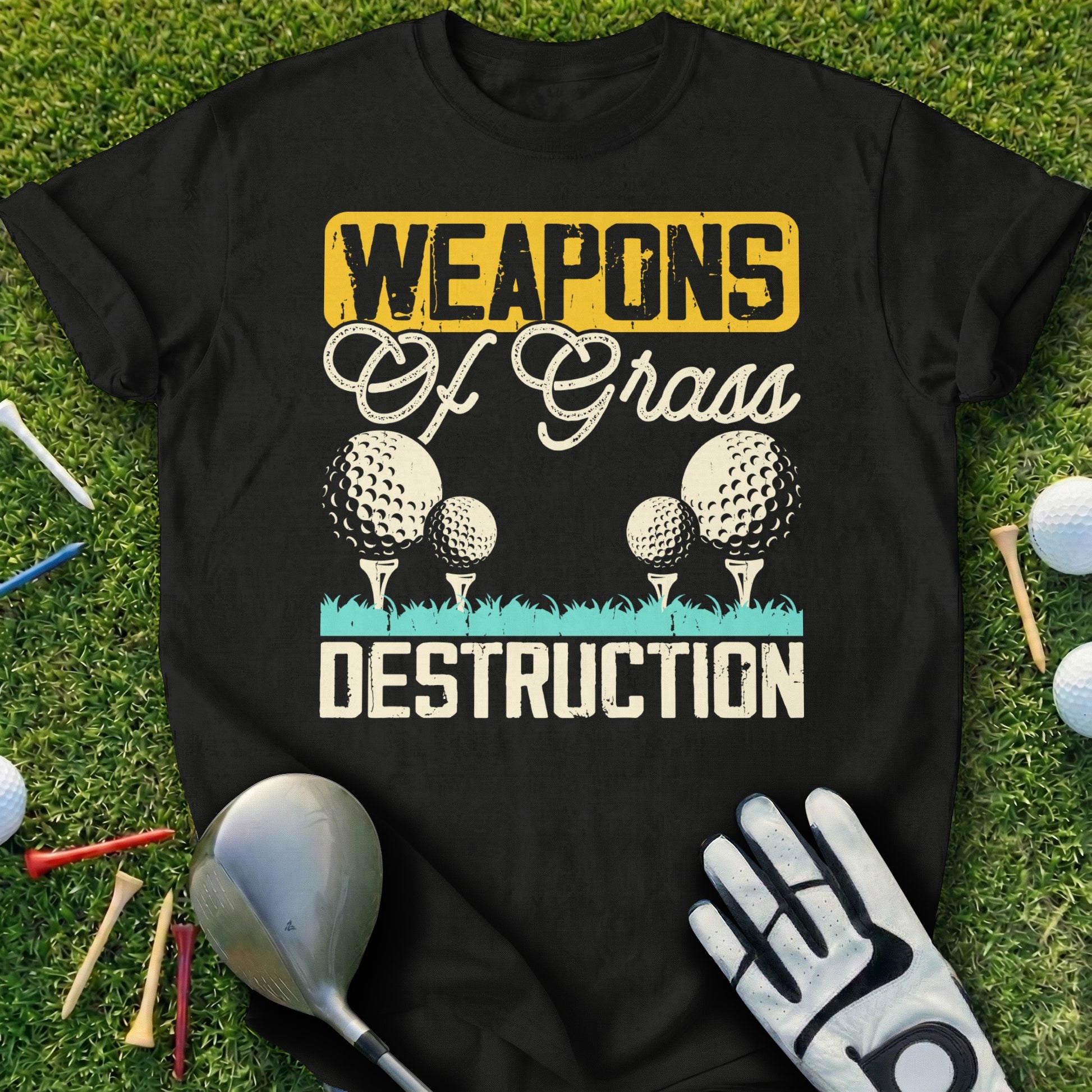 Black t-shirt with "Weapons of Grass Destruction" and golf imagery.