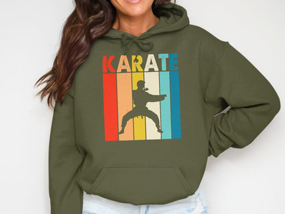 Retro silhouette of a karateka in front of colorful stripes with the word KARATE.