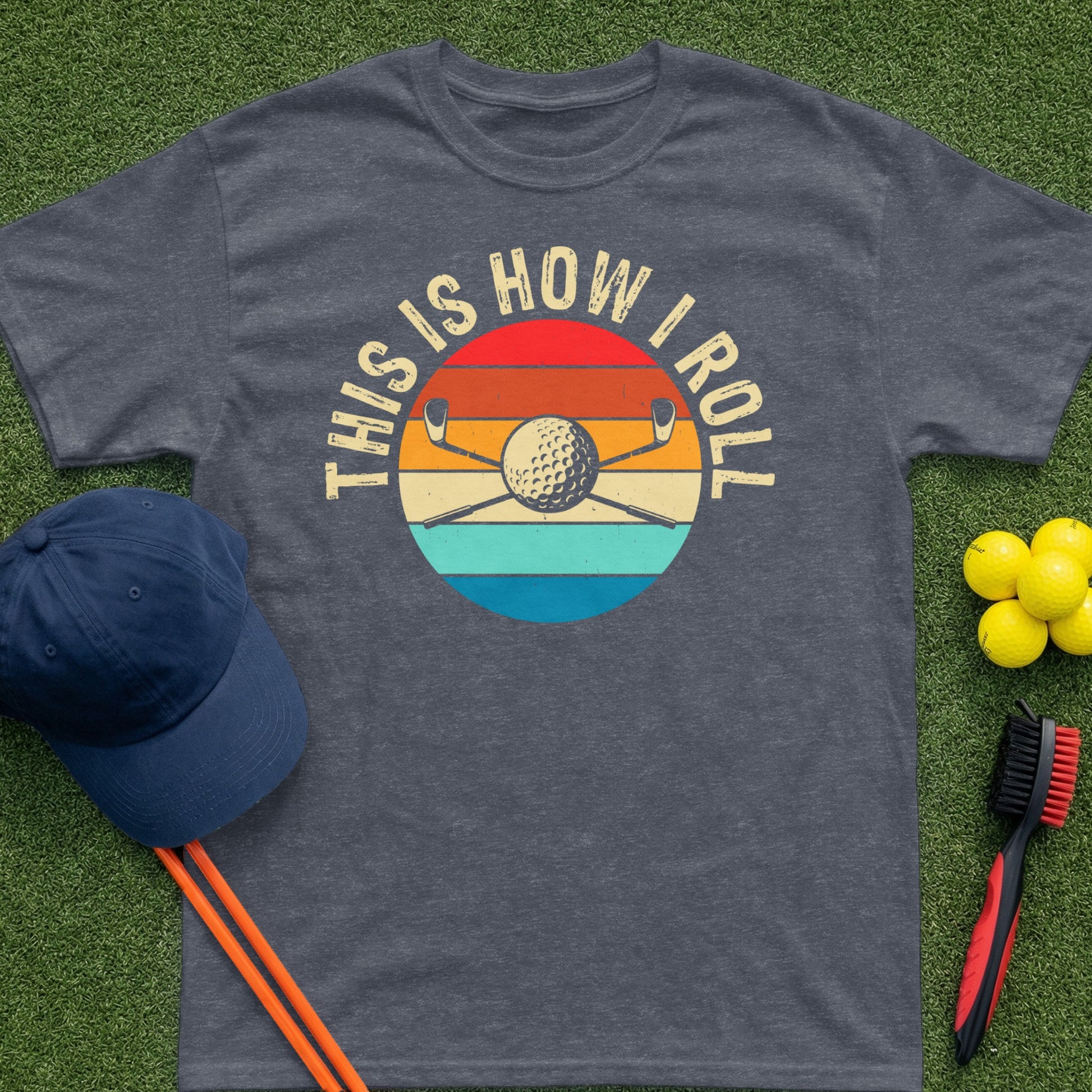 T-shirt with "This is how I roll" text, golf clubs, and balls.