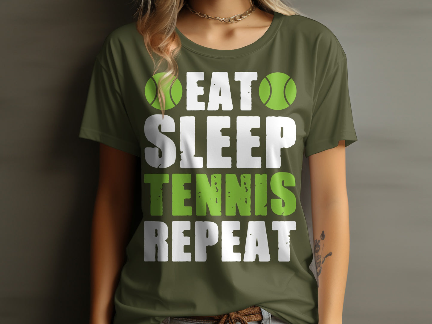 Green t-shirt with "Eat Sleep Tennis Repeat" text and tennis balls.