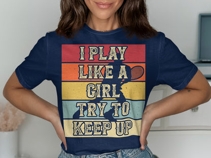 Navy t-shirt with "I Play Like a Girl Try to Keep Up" and tennis player graphic.