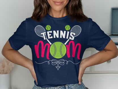 Navy t-shirt with "Tennis Mom" in pink script, tennis balls, and rackets.
