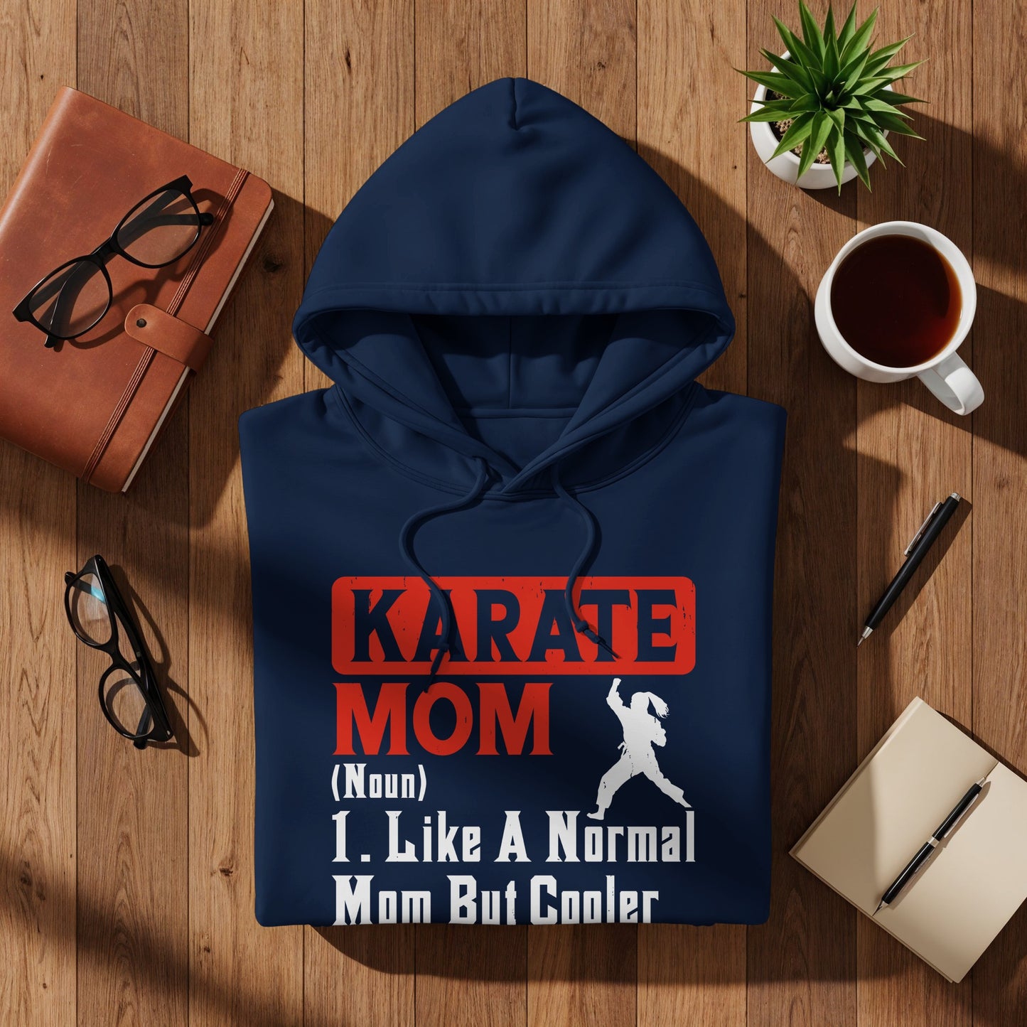 Navy hoodie with "KARATE MOM I. Like A Normal Mom But Cooler" text and graphic.