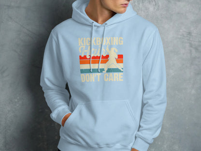 Light blue hoodie with "Kickboxing Hair Don't Care" text and fighter graphic.