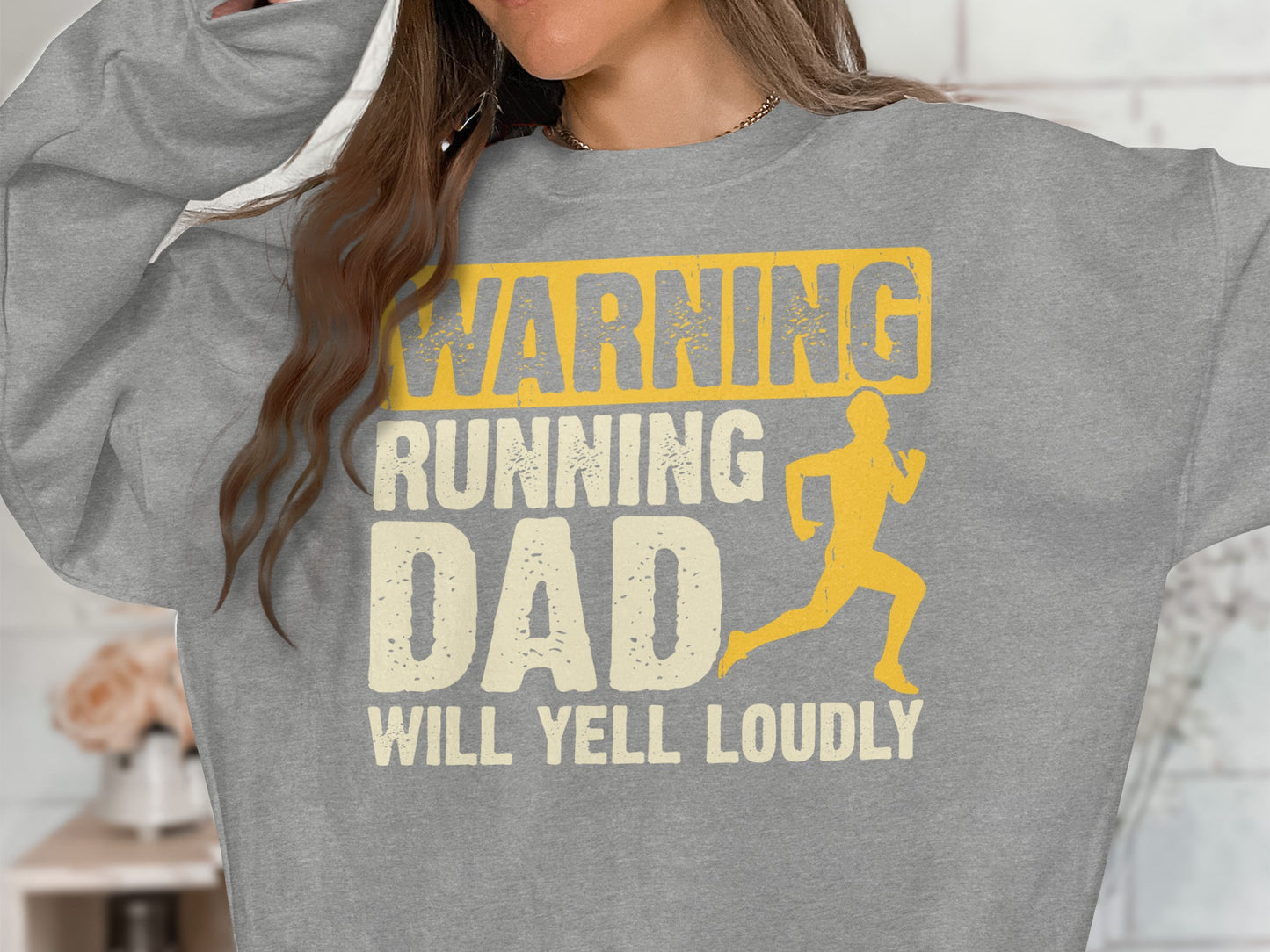 Gray sweatshirt with "WARNING RUNNING DAD WILL YELL LOUDLY" and running man graphic.