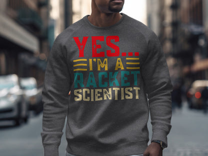 Gray sweatshirt with "YES... I'M A RACKET SCIENTIST" text.