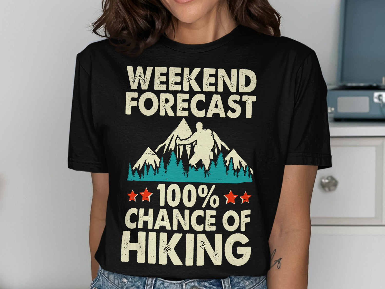 Black t-shirt with "Weekend Forecast 100% Chance of Hiking" and mountain graphic.