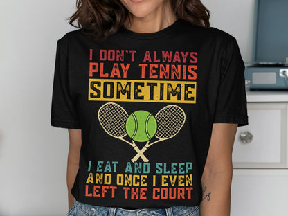 Black t-shirt with "I Don't Always Play Tennis Sometime I Eat and Sleep" text and crossed rackets.
