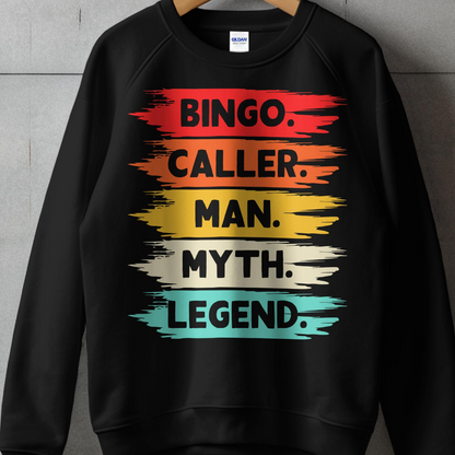 Black sweatshirt with "Bingo. Caller. Man. Myth. Legend." text in colorful brush strokes.